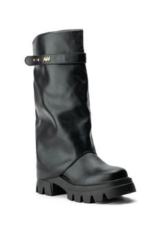 The AZALEA WANG Jet-Black covered knee high boot. This faux leather boot features a below the knee shaft, a belted detail with metallic AW logo accent, and a fold over design wedge heel. Complete with a pointed toe, a concealed inner elastic panel shaft for a flexible fit, and slip on fit. Style these with any outfit to create a classy, elevated minimalist look! Futuristic Boots, Aw Logo, Tomorrowland Outfit, Calf High Boots, Vegan Leather Boots, Azalea Wang, Sandal Platform, Faux Leather Boots, Black Cover