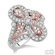 a white and pink diamond ring with an intricate design on the center, surrounded by smaller diamonds