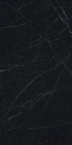 black marble textured with white lines on the top and bottom, as seen from above