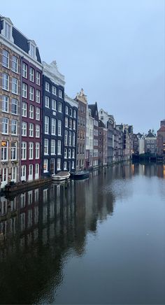 several buildings line the water in front of them