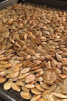 pumpkin seeds are being cooked in an oven