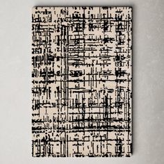 a black and white abstract painting on a wall