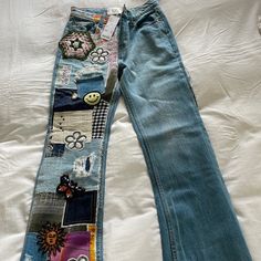 several pictures of different types of jeans with buttons and patches on the bottom, one is blue