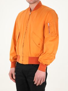 Long-sleeved orange jacket. It features front zip closure, two side buttoned flap pockets, one zipped pocket on left sleeve and contrasting details on neck, cuffs and hem. The model is 184cm tall and wears size 48. Size nationality: IT Product number: 35774814 Product code: 22CTCUC04064A06105434 Composition: 60% polyester, 40% polyamide Sporty Orange Long Sleeve Outerwear, Orange Long Sleeve Outerwear With Pockets, Hooded Orange Outerwear With Pockets, Orange Outdoor Outerwear With Pockets, Paul Harvey, Orange Long-sleeve Outerwear With Pockets, Orange Jacket, Loafer Sneakers, Field Jacket