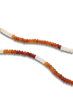 Hand strung Citrus Opal necklace in powerful contrasting brown and white colors that goes with anything. Opal 14 Karat Gold 16 to 17 inches Handmade in NYC White Double Strand Natural Stone Beaded Necklace, White Double Strand Beaded Necklace With Natural Stones, White Double Strand Necklace With Polished Beads, White Double Strand Necklaces With Polished Beads, White Double Strand Beaded Necklaces With Natural Stones, White Gemstone Necklaces With Round Beads, White Double Strand Gemstone Beaded Necklace, White Colors, Opal Necklace