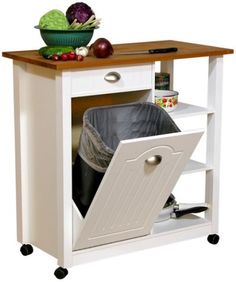 a kitchen island with an open dishwasher on it's side and a wooden top