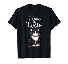 a black and white cat that says i love my tuxie