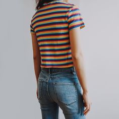 Stretchy ribbed crop top with colorful stripes.S: 13" across shoulders, 27.5" chest, 17" lengthM: 13.5" across shoulders, 29" chest, 17.5" lengthL: 14" across shoulders, 30.5" chest, 18" length Tomboy Tops, Gay Outfits, Ribbed Crop Top, Striped Crop Top, Top 4, Nail Accessories, Pastel Rainbow, Rainbow Stripes, Orange Yellow