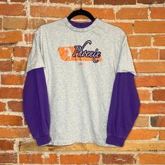 Vintage Early 2000's Phoenix Suns long sleeve t-shirt Brand: Reebok Size: Youth Large (14-16) Throwback Long Sleeve T-shirt For College, Winter Sports Long Sleeve T-shirt, 90s Long Sleeve T-shirt For Spring, Throwback Long Sleeve Tops With Letter Print, 90s Style Long Sleeve T-shirt For Spring, Fall Sports Long Sleeve T-shirt, Throwback Long Sleeve Letter Print T-shirt, Throwback Long Sleeve T-shirt For Streetwear, 90s Long Sleeve T-shirt For College