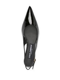 patent-leather slingback pumps from DOLCE & GABBANA featuring black, calf leather, patent finish, pointed toe, slingback strap, branded insole and low heel. Size Info IT Color Detail Black Made In Italy Material Lining: 100% calfskin Sole: 100% calfskin Exterior: 100% calf leather Season One Fall-Winter Season Two Fall-Winter Product with heel Brand Dolce & Gabbana Size And Fit Heel 1,4 in / 3,5 cm Luxury Leather Slingback Pumps With Glossy Finish, Glossy Leather Slingback Pumps For Formal Occasions, Designer Patent Leather Slingback Pumps For Work, Patent Leather Slingback Pumps With Low Heel, Patent Leather Slingback Pumps With Branded Insole, Luxury Patent Leather Slingback Pumps With Ankle Strap, Elegant Patent Leather Slingback Pumps With Glossy Finish, Luxury Patent Leather Slingback Pumps For Work, High Heel Patent Leather Slingback Pumps With Branded Insole