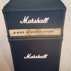 two marshall amps stacked on top of each other