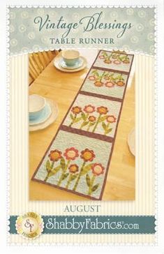 the table runner has flowers on it and is ready to be used as an applique