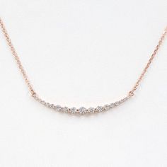 "JSVConcepts Fine Jewelry Diamond Necklace, Curved Bar Diamond Necklace, Wedding Necklace, Bridal Necklace, Wedding Jewelry, Minimalist Necklace, Anniversary Gift ≫ Product Details ◈ Handmade / Handcrafted Fine Jewelry ◈ Diamond: 100% Natural Diamond ◈ Carat Weight: 0.7 ctw. (Total 17 pcs) 1 x 3.1 mm (center diamond) 2 x 2.7 mm 2 x 2.5 mm 2 x 2.3 mm 2 x 1.8 mm 2 x 1.6 mm 2 x 1.5 mm 4 x 1.2 mm ◈ Charm Size: 1 5/8\" ◈ Color: G-H ◈ Clarity: VS2-SI1 ◈ Cut: Brilliant Cut ◈ Metal: Solid 14K Gold (18K Diamond Necklace Wedding, Diamond Signet Ring, Gold Moon Necklace, Diamond Pendant Sets, Curved Bar, Necklace Bridal, Jewelry Minimalist, Necklace Diamond, Necklace Wedding