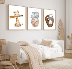 three framed pictures of animals in baseball uniforms on a wall above a bed and chair