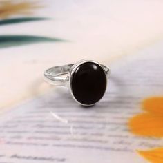 Center Gemstone : Black onyx  Material : Gemstone Ring Gemstone Creation : Natural Gemstone Shape : oval Metal : 925 Sterling Silver Black Rings Gift, Hallmarked Black Rings For Gifts, Black Birthstone Rings, Black Birthstone Rings For Gifts, Black Hallmarked Rings For Gift, Black Birthstone Ring Gift, Black Sterling Silver Rings With Birthstone, Anniversary Onyx Rings Stamped 925, Black Sterling Silver Birthstone Rings