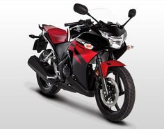 a red and black motorcycle on a white background