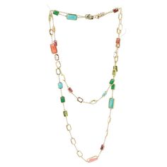 An Ippolita Gold and Multicolored Gemstone Longchain Station Necklace from the Rock Candy collection featuring stones of bright natural hues of different sizes all rectangular in shape and bezel set. Necklace measures 34 inches in length and can be attractively double wrapped around the neck. -18 karat yellow gold -Featuring multiple colored gemstones -Signed Ippolita at the clasp -34 inches in length Luxury Multicolor Natural Stone Crystal Necklaces, Luxury Multicolor Natural Stones Crystal Necklace, Modern Multicolor Rectangular Jewelry, Modern Multi-stone Rectangular Jewelry, Modern Multicolor Jewelry With Stones, Modern Multicolored Multi-stone Gemstones, Modern Multicolor Stone Jewelry, Luxury Multicolor Natural Gemstones, Multicolor Rectangular Necklace With Natural Stones