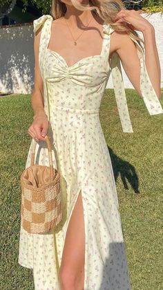 cottagecore tie strap midi dress, cottagecore dress bow floral dress , aesthetic floral dress, cottagecore aesthetic dress, cottagecore outfits, cottagecore fashion, spring outfit idea 2022, msxi dresses, floral puff sleeve midi dress, cottagecore sundress, yellow dresses, cottagecore fits, cottagecore fashion dresses, bohemian ruffled floral dress , cottage core dress aesthetic, boogzel apparel Long Summer Dress Outfits, Vestidos Color Pastel, Cottage Core Dress, Cottagecore Outfits, Cottagecore Fashion, Midi Sundress, Dress Aesthetic, Summer Dress Outfits, Long Summer Dresses