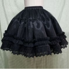 Details:    25% OFF All Site Promo Now. Plus   Extra10% OFF   1st Order. Free Shipping $60. Free Exchange & Easy Returns.    The    4+2 Layered Tulle Pettiskirts       features multi layered, adjustable waistband for elastic waist fitting, puffy petticoat, lace embroidered Trimmed Lace and Fitted in all the right places.    White Lace 45cm Petticoat Skirts    is classic for trips, clubs, parties, ballet, dances and costume underskirts.   Material: 11 meters organza Color:White/Black Size Details: One Size For All Waist 52-110 cm Design: Elastic Fitting, Puff, Layered, Boned, Circle, Large Petticoat and Trendy Style. Weight: approx 0.34 kg Machine Wash Cold. Delivery: 9-14 Business Days Delivered US, 11-14 Business Days Delivered in Europe. Spring Crinoline Skirt For Costume Party, Black Summer Tulle Petticoat, Summer Black Tulle Petticoat, Black Tulle Petticoat For Summer, Spring Black Full Skirt Petticoat, Black Full Skirt Petticoat For Spring, Black Ruffled Full Skirt Petticoat, Vintage Black Skirt For Costume Party, Black Tiered Skirt Petticoat For Summer