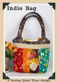 an image of a handbag made out of different fabrics and fabric material, with the words india bag on it