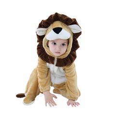 a small child wearing a lion costume