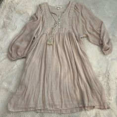 New Without Tags, Never Been Worn. Size Small But Runs Big Bohemian Beige Mini Dress For Brunch, Beige Bohemian Mini Dress For Brunch, Bohemian Beige Mini Dress, Bohemian Beige Mini Dress For Day Out, Cute Beige Cotton Mini Dress, Beige Bohemian Dress For Brunch, Beige Cotton Mini Dress With Lace Trim, Beige Boho Dress For Fall Vacation, Beige Flowy Boho Dress Casual Style