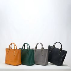 The eco-friendly dyeing process makes it more durable and comfortable.Made of high quality imported first layer cowhide, soft and fine. Minimalist, slouchy and versatile. Color: black, dark green, sunset yellow, Morandi grayMaterial: vegetable tanned Cowhide leatherInner material: cotton clothShoulder strap: adjustable, detachableCarrying method: Diagonal straddle, single shoulder, hand carryStructure: 1 main pocket, 1 internal patch pocket, 1 zipper compartment Production Time: About 1-3 days ( Solid Leather Satchel Bags, Leather Bag With Smooth Grain, Luxury Vegetable-tanned Tote Shoulder Bag, Leather Bags For Work, Solid Color Leather Handheld Shoulder Bag, Leather Backpack With Top Handle, Smooth Grain Crossbody Bag For Shopping, Handheld Soft Leather Satchel, Modern Vegetable Tanned Leather Bag With Leather Lining