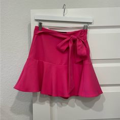 Hot Pink Zara Skirt. Never Worn. Chic Tie Waist Flowy Skirt, Chic Flowy Skirt With Tie Waist, Chic Flowy Tie Waist Skirt, Chic Brunch Skort With Relaxed Fit, Spring Skirt With Tie Waist, Zara Ruffled Mini Skirt For Day Out, Zara Chic Tiered Skirt, Zara Ruffled Skirt For Day Out, Chic Zara Tiered Skirt