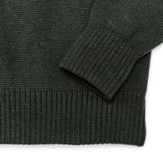 Made in the USA, the Filson Crewneck Guide sets the standard for what a sweater should be–non-bulky, with density that makes it exceptionally warm and durable. With ample stretch and outstanding breathability, this sweater would be unnoticeable to wear if not for its exceptional warmth. The rib-knit collar, cuffs and hem ensure a custom fit and retain their shape year after year. The USA-sourced wool comes from merino sheep prized for their long, fine fleece. Merino wool's wavy crimp yields a soft and sturdy fabric with natural memory and shape retention. Merino wool fibers consist of thousands of tiny filaments sheathed within overlapping scales that are naturally water-resistant, and any moisture that does penetrate the fiber is wicked to the tips for evaporation. This capillary action i Funnel Neck Sweater With Ribbed Cuffs For Cold Weather, Wool Crew Sweater With Ribbed Cuffs, Fitted V-neck Sweater With Ribbed Cuffs For Winter, Classic Sweater With Funnel Neck And Ribbed Cuffs, Classic Funnel Neck Sweater With Ribbed Cuffs, Outdoor Merino Wool Long Sleeve Sweater, Outdoor Long Sleeve Merino Wool Sweater, Crew Neck Sweater With Ribbed Cuffs For Winter, Cashmere Sweater With Ribbed Cuffs For Cold Weather