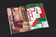 an open magazine with columns and numbers on the front cover is shown in black, red, green and white