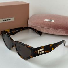 Brand New Miu Miu Mu03zs Vau06b Sunglasses In Honey Havana. Featuring A Brown Havana Acetate Frame With Dark Brown Lenses. Gold Miu Miu Detailing On Temples. Size 54-17-140. Adjustable Nose Pads! 100% Authentic And Unworn. Made In Italy. Box, Case, Cloth And Paperwork Included. Retail Price $439. Miu Miu Sunglasses Cat Eye, Havana Brown Cat, Brown Cat Eye, Miu Miu Accessories, Miu Miu Sunglasses, Brown Cat, Havana Brown, Colored Sunglasses, Brown Gold