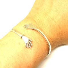 "This is a female symbol for lesbian pride. Base Material: 925 Sterling Silver Depth: 23 mm (Approximately) Metal Stamped: 925 Thickness: 1mm (Approximately) Wrist Size: Adjustable. SPECIAL ANNOUNCEMENT 1. Please visit https://www.etsy.com/shop/yhtanaff for more designs. 2. Subscribe our newsletter to receive a Coupon Code for 10% discount. \"At Our Shop Profile's Announcement Section\" 3. Please LIKE our Facebook Fan Page: URL: https://www.facebook.com/HandmadeSilverJewelryByYhtanAff" Modern Sterling Silver Friendship Bracelets, Sterling Silver Promise Bracelets, Sterling Silver Friendship Bracelet, Symbolic Sterling Silver Friendship Bracelets, Infinity Knot Ring, Stethoscope Necklaces, Motivational Jewelry, Knot Bangle, Female Symbol