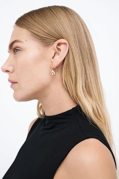 Modernism and minimalism collide in our Venus Drop Earrings. With a sleek profile and a reflective finish reminiscent of brilliant city lights, these sterling silver drop earrings are handcrafted to make your style shine day after day, night after night, season after season. Each pair includes a Marcella-branded vegan leather travel case for safe storage and easy travel.[SPLIT] Available in one size. Approximately .75” (2 cm) long. 18KT yellow gold plated brass. In silver, rhodium plated brass. Modern Long Drop Jewelry For Everyday, Modern Long Drop Everyday Jewelry, Minimalist Polished Earrings For Evening, Minimalist Earrings With Shiny Finish For Formal Events, Minimalist Earrings With Shiny Finish For Formal Occasions, Minimalist Formal Earrings With Shiny Finish, Modern Wrap Earrings With Ear Wire, Modern Polished Finish Linear Earrings For Gift, Gift Polished Finish Linear Earrings