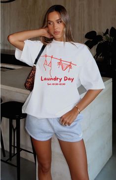 Laundry Day Classic Tee. Please note this tee is true to size If you want an oversized tee like the one in the pictures you will need to go up a few sizes.  Model in the pictures is wearing an 3XL. Please refer to the size guide for your correct sizing. As these tees are custom made we are unable to offer returns due to wrong sizing. Please ensure you are measuring for sizing, if you are unsure I recommend comparing it to a tee you already own.  Made with 100% Cotton  FAQ - How long will it take to receive my order? Production time: * 2-3 business days Delivery times: * USA = standard shipping: 2-5 business days = economy shipping: 4-8 business days  * United Kingdom: 5-7 days  * Europe: 5-10 days * Australia: 5-10 days * Canada: 5-10 days * Rest of the world: 7-10 days Tshirt Aesthetic, Art Shirt, Laundry Day, Trendy Art, Aesthetic Y2k, Play Dress, Art Shirts, Oversized Tee, Oversized Shirt