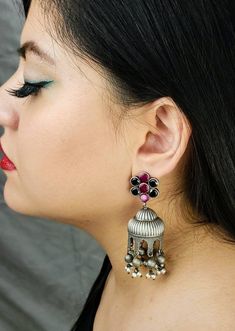 Gather compliments wearing this Indian jhumka earrings with flashy CZ ear studs. In faux diamond, ruby, emerald, and blue sapphire. Voluptuous shape. Very feminine and pretty! Tiny dangly metal balls and pearls finish the look. Earrings are cast metal, not stamped, so they look and feel substantial. find even more great earrings here: https://www.etsy.com/shop/boutiquebymaryam?section_id=22797814 Be sure to visit the rest of my shop here: https://www.etsy.com/shop/boutiquebymaryam All my jewelry Fusion Style Dangle Jhumkas, Silver Chandbali Earrings With Jewels, Silver Jeweled Chandbali Earrings, Silver Jeweled Chandbalis As Gift, Silver Jeweled Earrings For Diwali, Silver Jeweled Earrings For Festive Occasions, Fusion Style Jhumkas With Latkans For Gift, Silver Jeweled Earrings For Festivals, Silver Jeweled Earrings For Festive Season