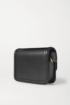 Black Solferino small leather shoulder bag | SAINT LAURENT | NET-A-PORTER Classic Everyday Flap Bag With Gold-tone Logo Plaque, Classic Rectangular Flap Bag For Everyday Luxury, Timeless Rectangular Shoulder Bag With Gold-tone Logo, Classic Leather Flap Bag With Gold-tone Logo, Leather Flap Bag With Gold-tone Logo For Everyday Use, Luxury Black Flap Bag With Rectangular Case, Classic Shoulder Bag With Gold-tone Logo For Everyday Luxury, Luxury Black Flap Bag Rectangular Case, Luxury Black Rectangular Flap Bag