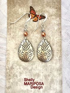 Etched silver and copper Boho teardrop earrings 🌸 These beautiful earrings are VERY lightweight! The silver and copper are a great combination with floral etching on the silver pieces. These earrings are 1.5 inches xlong and a half inch wide. Weight is 2.0 grams. French earwires are sterling silver. All my jewelry comes gift boxed with a custom Shelly Mariposa Design butterfly card ready for gift giving, whether it is a gift for you or someone special. Your satisfaction is very important to me. Abalone Necklace, Design Butterfly, Butterfly Card, Dangle Earrings Silver, Earrings Bohemian, Wire Wrapped Earrings, Jewelry Boho, Silver Pieces, Silver Earrings Dangle