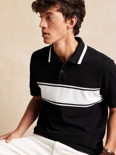 Made from sustainable 100% organic cotton, this sporty pique polo has plenty of style with a racing stripe on the chest and pique stripes to match.  ORGANIC: Made with certified, organically grown cotton that's easier on the earth.  Polo collar with Classic Polo Shirt With Contrast Stripes, Cotton Polo Shirt With Horizontal Stripes, Cotton Polo Shirt With Signature Stripes, Classic Striped Polo Shirt With Collared Neckline, Black Cotton Polo Shirt With Striped Collar, Classic Collared Polo Shirt With Signature Stripes, Classic Polo Shirt With Signature Stripes, White Cotton Polo Shirt With Horizontal Stripes, White Horizontal Stripe Cotton Polo Shirt