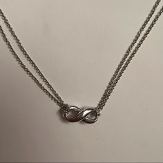 Tiffany & Co. 925 Sterling Silver Double Chain Infinity Necklace. Length: 16”. Great Condition. Jewelry Tiffany, Infinity Necklace, Tiffany Co Jewelry, Double Chain, Necklace Length, Tiffany & Co., Womens Jewelry Necklace, Jewelry Necklaces, 925 Sterling Silver