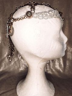 Stunning vintage old gold and super sparkling rhinestones headdress. This headpiece has a central piece all covered in strass and sparkling white rhinestones combined with antique afgan pieces that gives the whole piece an awesome movement and elegant look. On the back, a flower shaped rhinestones, and an old kuchi piece will make your look the most incredible and sparkling in the room. One of my favorites, makes anyone look like an incredible vedette from the 20'. One of a kind, our headpieces Bohemian Round Crown Headpiece For Wedding, Bohemian Wedding Headpiece With Round Crown, Vintage Gold Headband For Party, Bohemian Crown Hair Accessories For Festivals, Bohemian Round Crown Headband For Party, Traditional Adjustable Headpieces For Parties, Bohemian Headband With Round Crown For Party, Bohemian Party Headband With Round Crown, Adjustable Festival Headpiece With Rhinestones