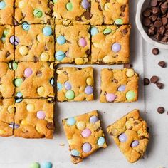 chocolate chip cookie bars cut into squares with easter eggs