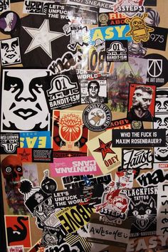 many different stickers are on the wall