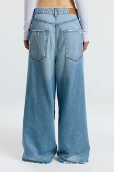 Baggy Jean – Cotton Citizen Oversized Dark Wash Jeans With Five Pockets, Oversized High-rise Denim Jeans, Oversized Frayed Denim Jeans, Oversized Light Wash Denim Jeans, Oversized Distressed Denim Bottoms, Oversized Distressed Denim Blue Jeans, Oversized Rigid Denim Blue Jeans, Oversized Distressed Straight Leg Jeans, Oversized Denim Bottoms With Five Pockets