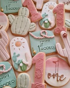 some decorated cookies are sitting on a table