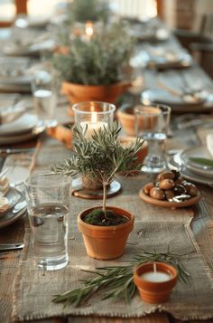 the table is set with dishes and place settings