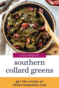 a bowl filled with collard greens next to other dishes