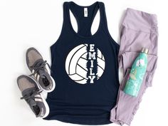 a women's tank top with an image of a volleyball ball and two pairs of shoes