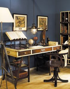 an old fashioned desk in a blue room