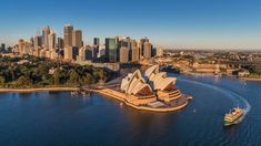 an aerial view of sydney, australia with the opera house and city in the background