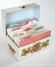 a box filled with lots of different types of candy in it's opening compartments